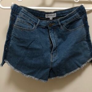 Blue SUGARHIGH shorts.